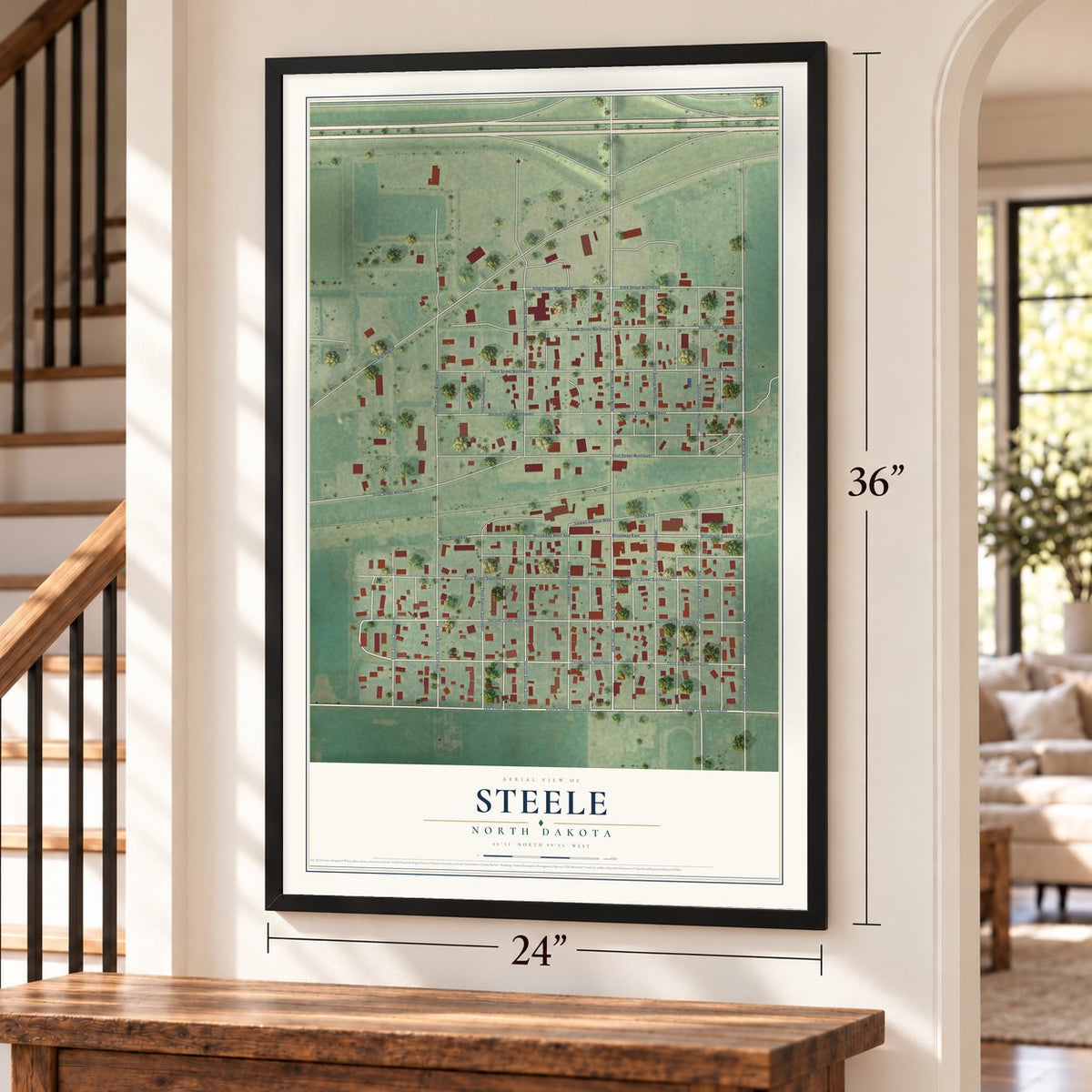 Steele, North Dakota map, 24 x 36 inch print in a black frame by a staircase