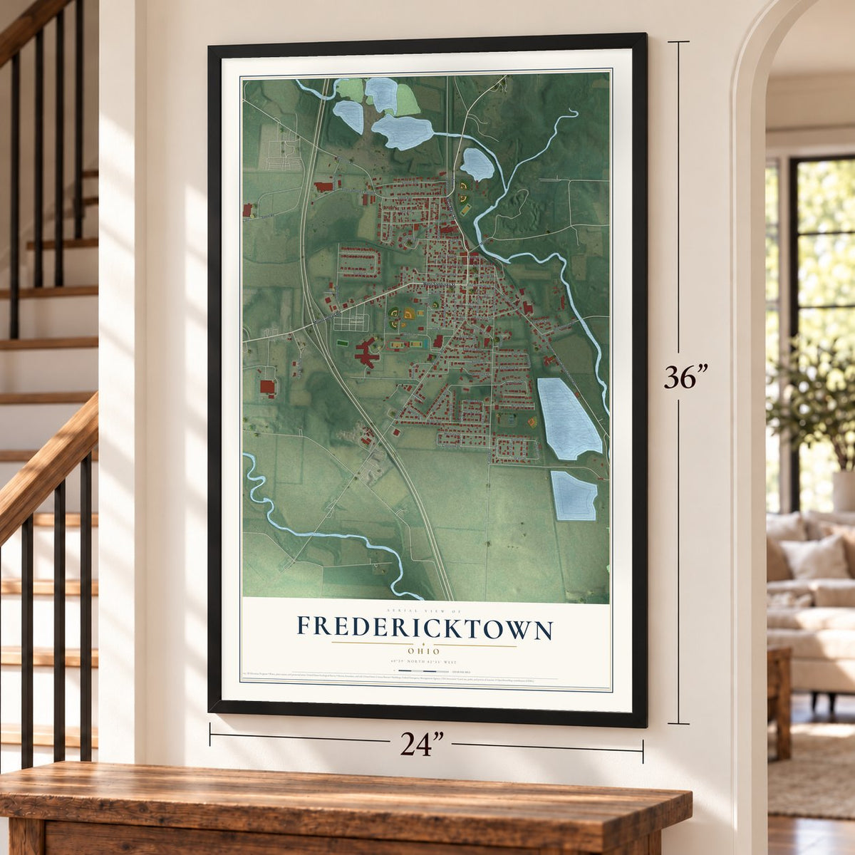 Fredericktown, Ohio map, 24 x 36 inch print in a black frame by a staircase