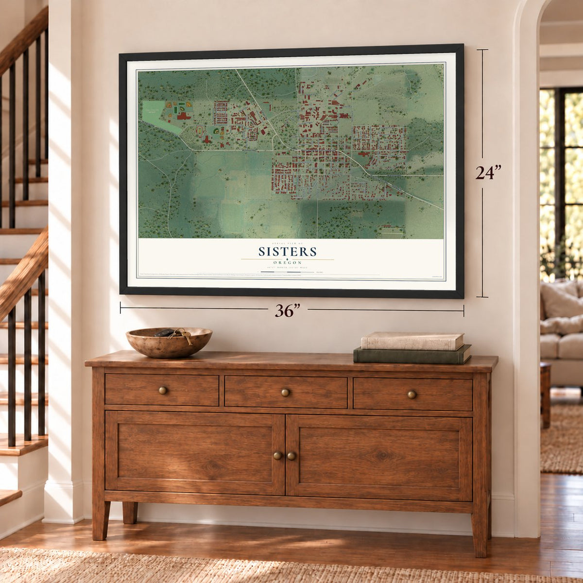 Sisters, Oregon map, 24 x 36 inch print in a black frame above a dresser by a staircase