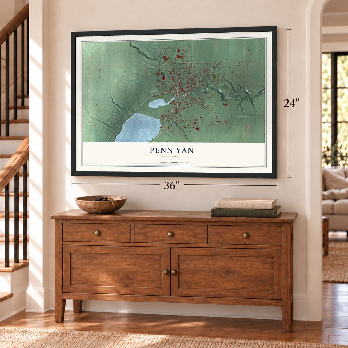 Penn Yan, New York map, 24 x 36 inch print in a black frame above a dresser by a staircase