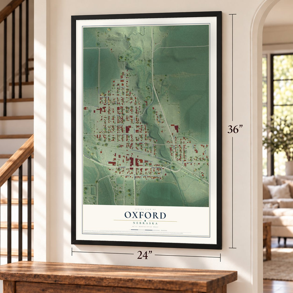 Oxford, Nebraska map, 24 x 36 inch print in a black frame by a staircase