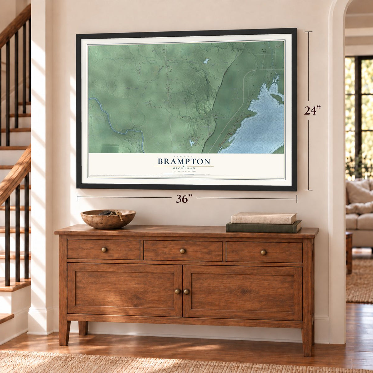 Brampton, Michigan map, 24 x 36 inch print in a black frame above a dresser by a staircase