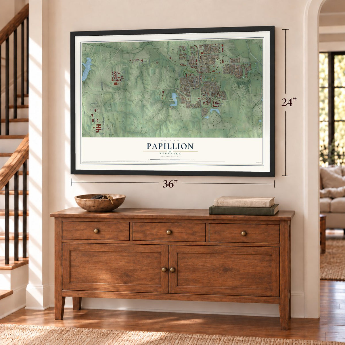 Papillion, Nebraska map, 24 x 36 inch print in a black frame above a dresser by a staircase