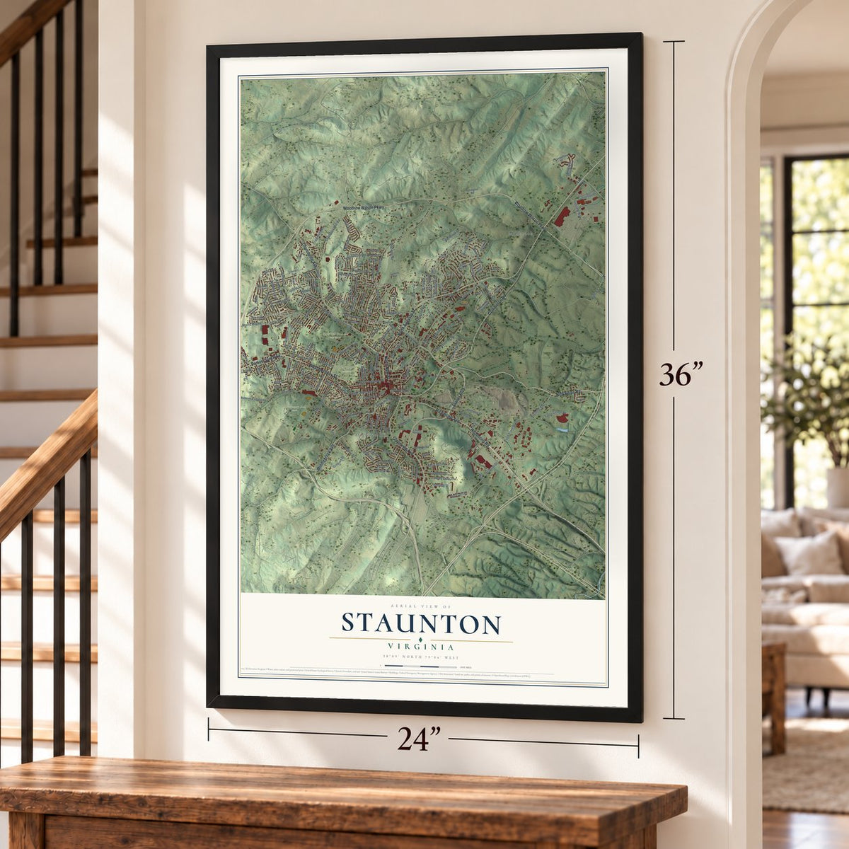 Staunton, Virginia map, 24 x 36 inch print in a black frame by a staircase