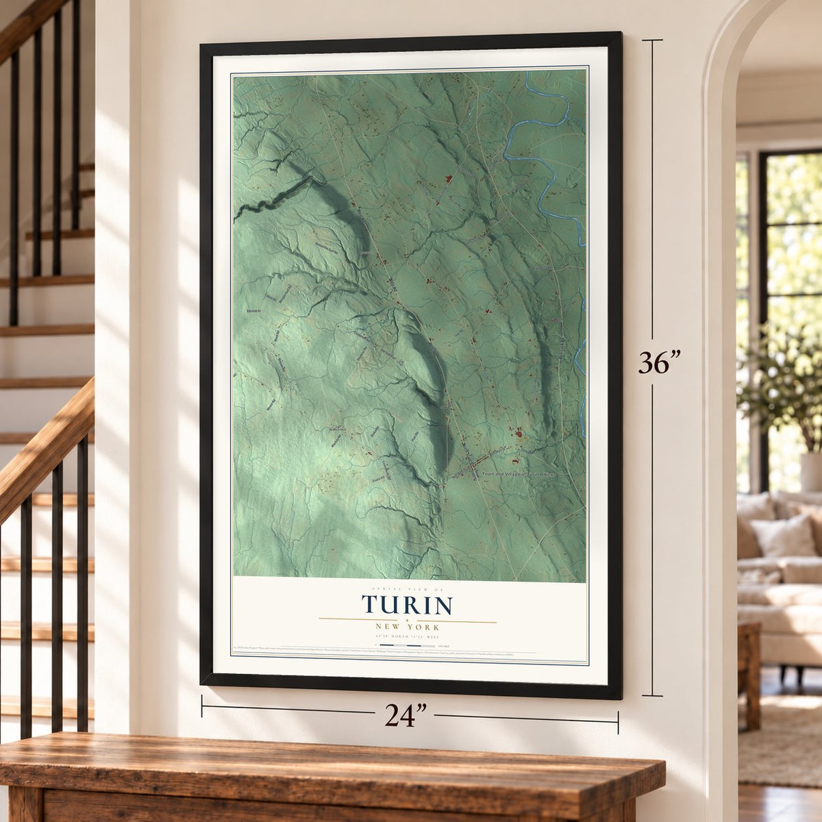 Turin, New York map, 24 x 36 inch print in a black frame by a staircase