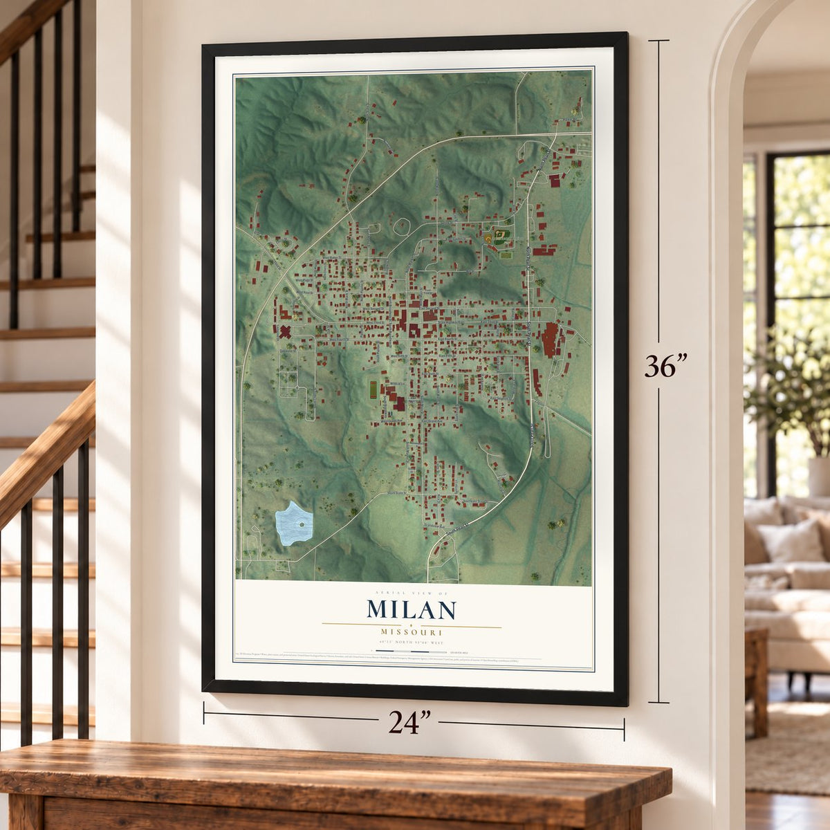 Milan, Missouri map, 24 x 36 inch print in a black frame by a staircase
