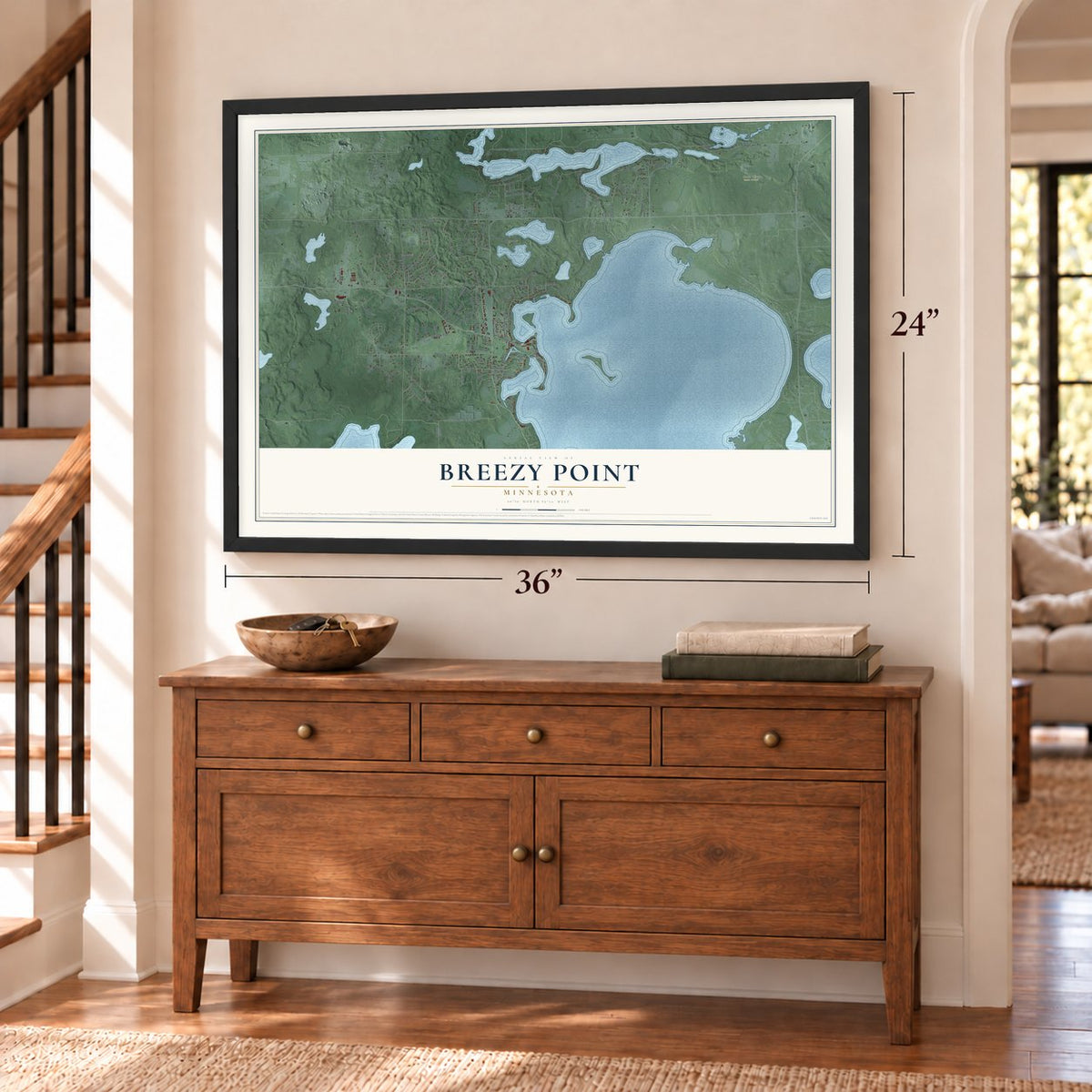 Breezy Point, Minnesota map, 24 x 36 inch print in a black frame above a dresser by a staircase