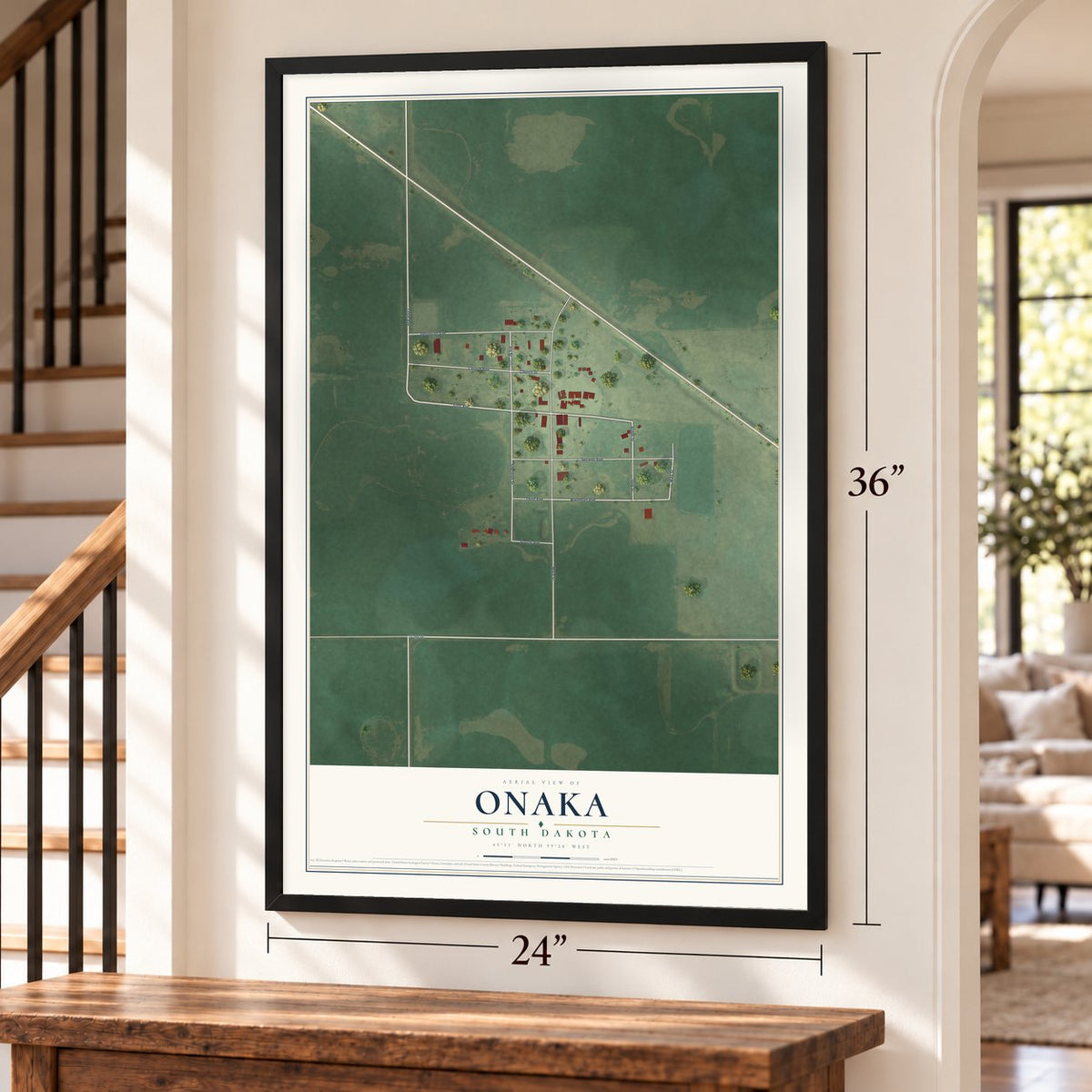 Onaka, South Dakota map, 24 x 36 inch print in a black frame by a staircase