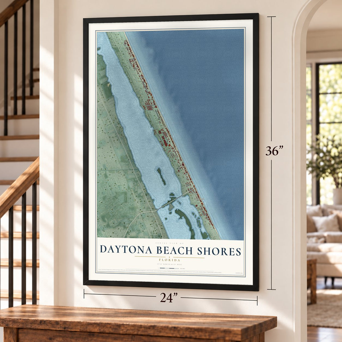 Daytona Beach Shores, Florida map, 24 x 36 inch print in a black frame by a staircase