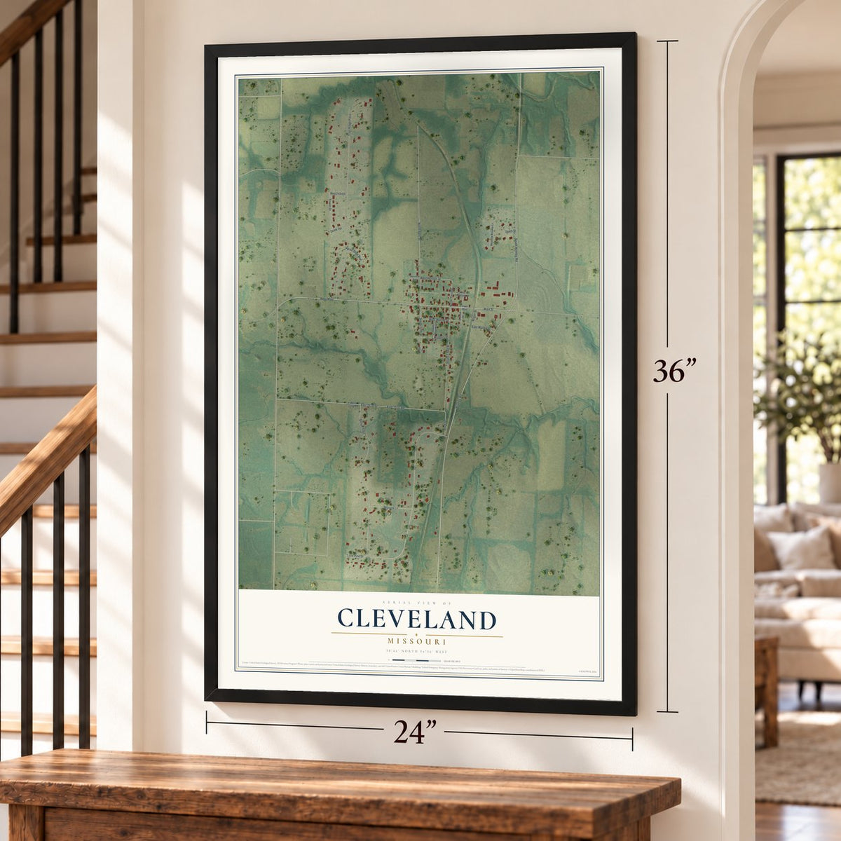 Cleveland, Missouri map, 24 x 36 inch print in a black frame by a staircase