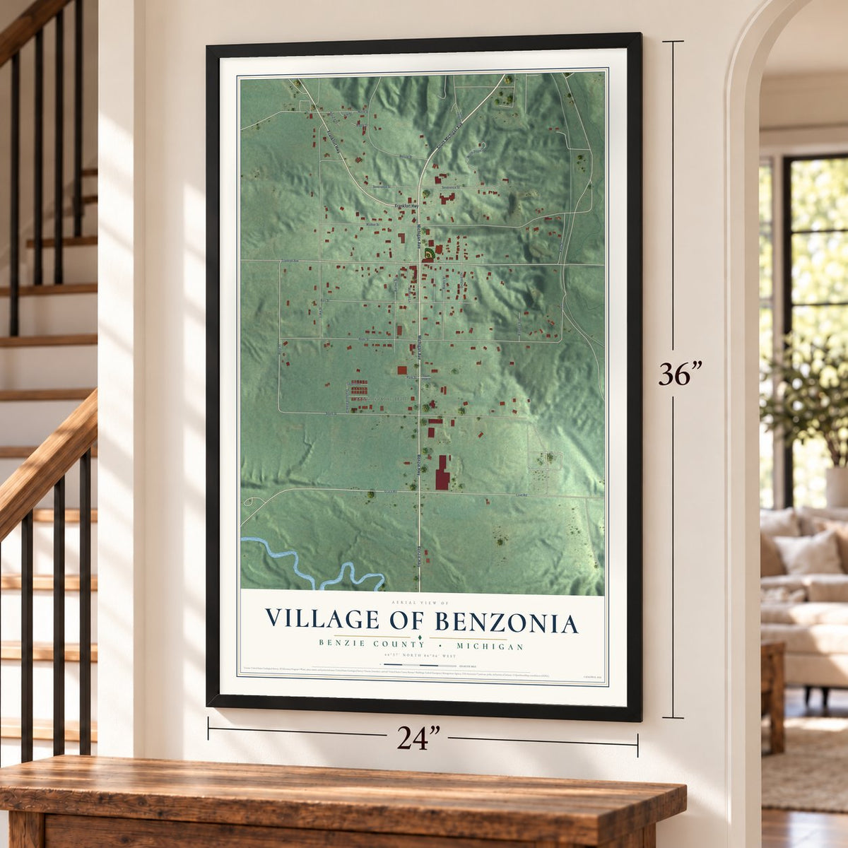 Benzonia, Michigan map, 24 x 36 inch print in a black frame by a staircase