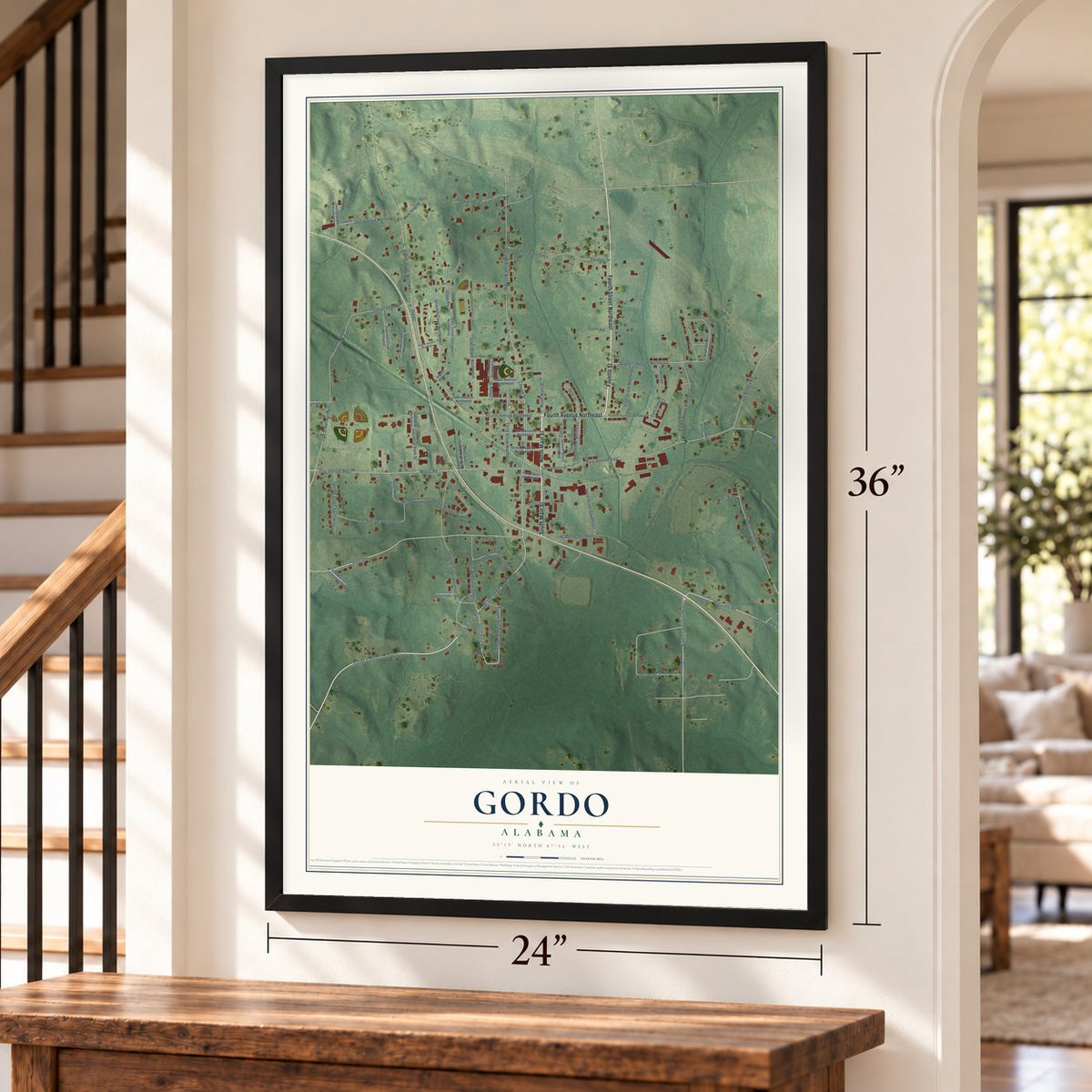 Gordo, Alabama map, 24 x 36 inch print in a black frame by a staircase
