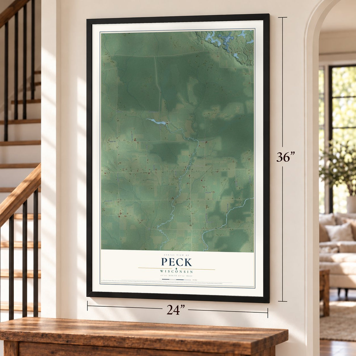Peck, Wisconsin map, 24 x 36 inch print in a black frame by a staircase