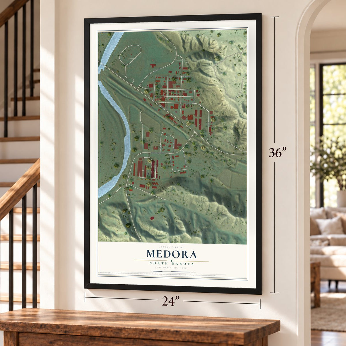 Medora, North Dakota map, 24 x 36 inch print in a black frame by a staircase