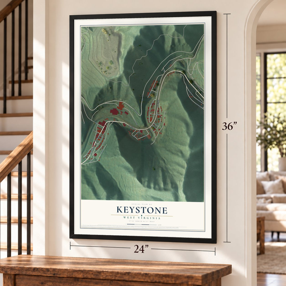 Keystone, West Virginia map, 24 x 36 inch print in a black frame by a staircase