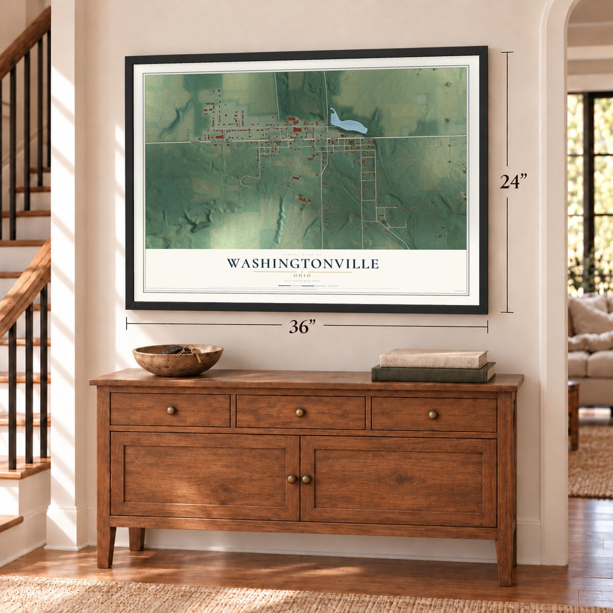Washingtonville, Ohio map, 24 x 36 inch print in a black frame above a dresser by a staircase