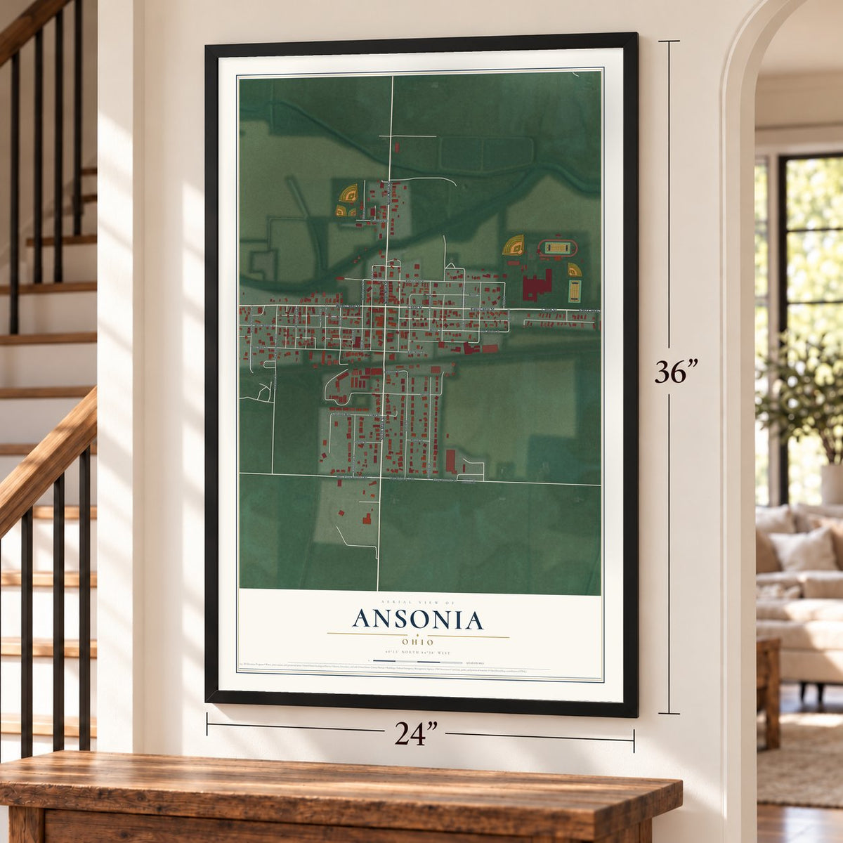 Ansonia, Ohio map, 24 x 36 inch print in a black frame by a staircase