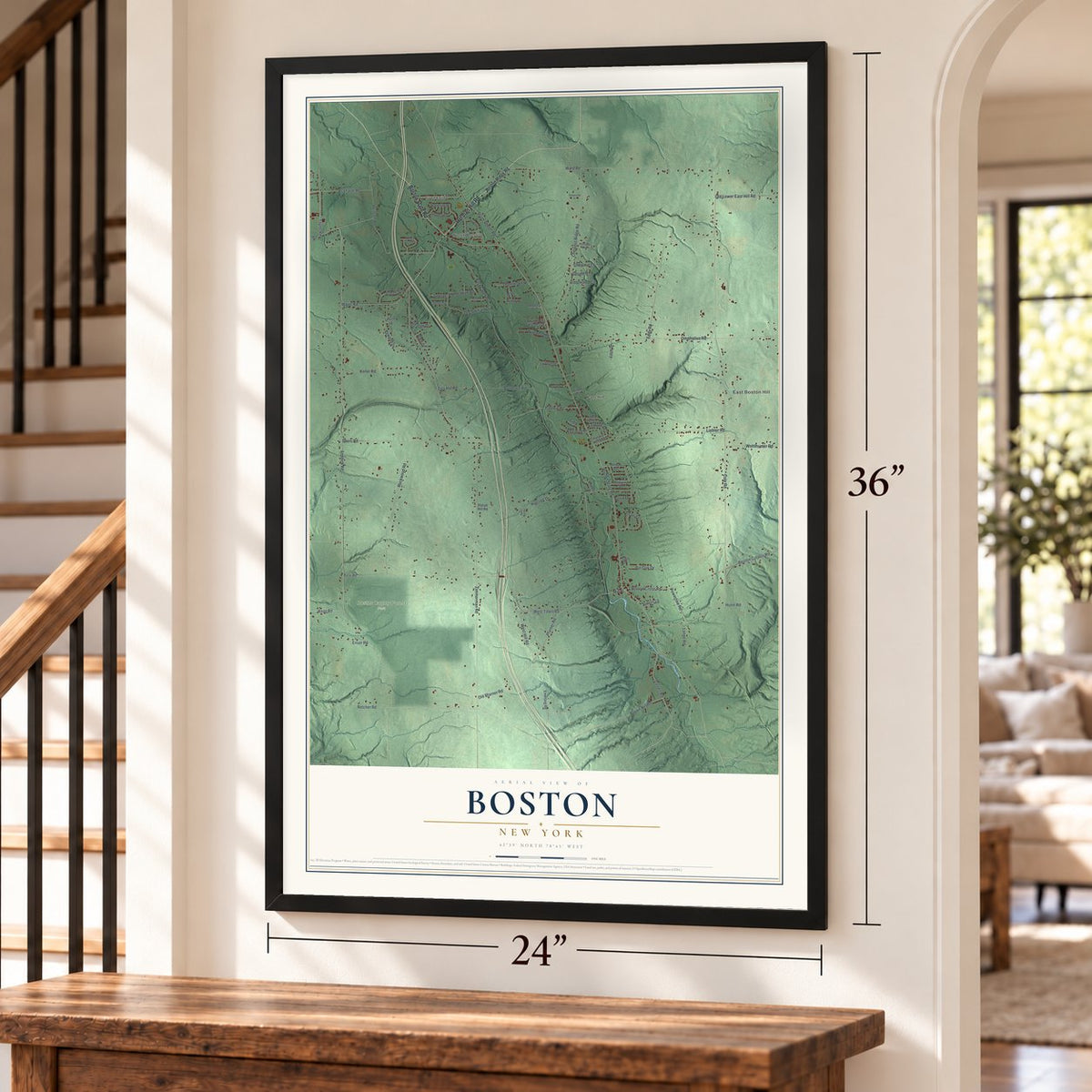 Boston, New York map, 24 x 36 inch print in a black frame by a staircase