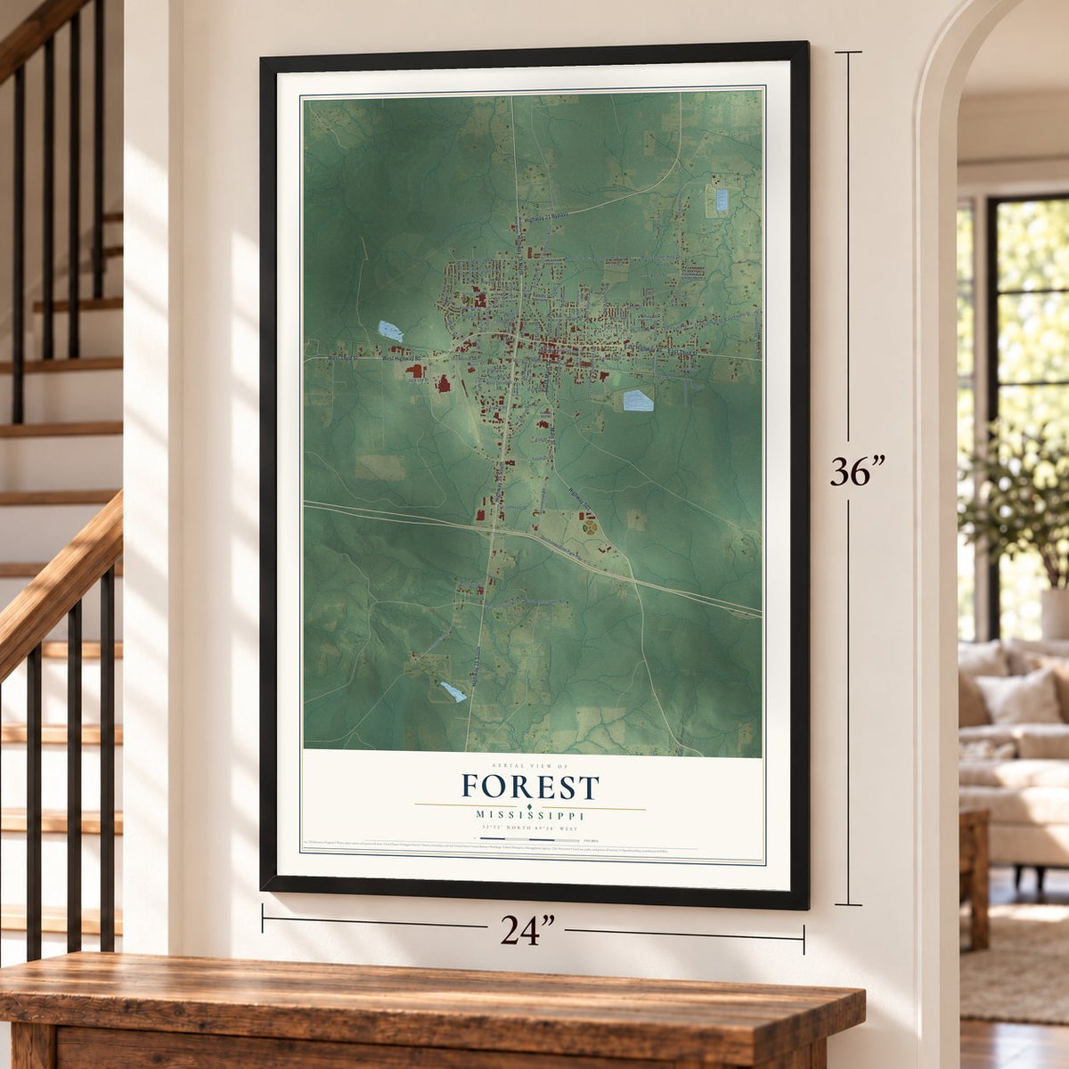 Forest, Mississippi map, 24 x 36 inch print in a black frame by a staircase
