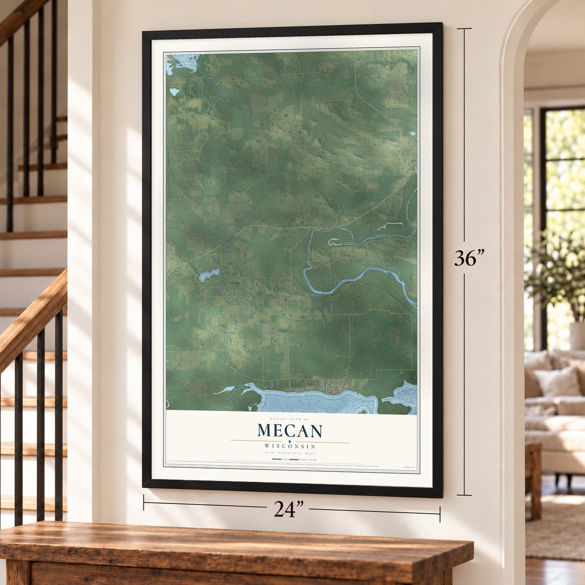 Mecan, Wisconsin map, 24 x 36 inch print in a black frame by a staircase