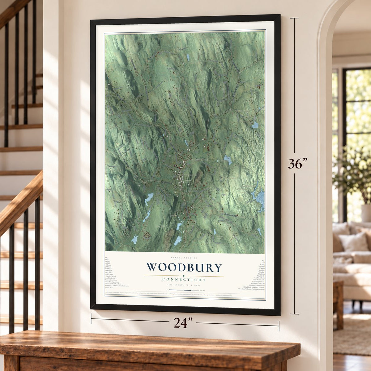 Woodbury, Connecticut map, 24 x 36 inch print in a black frame by a staircase