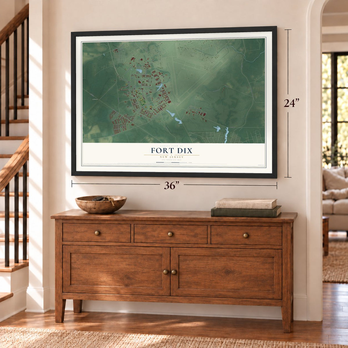Fort Dix, New Jersey map, 24 x 36 inch print in a black frame above a dresser by a staircase