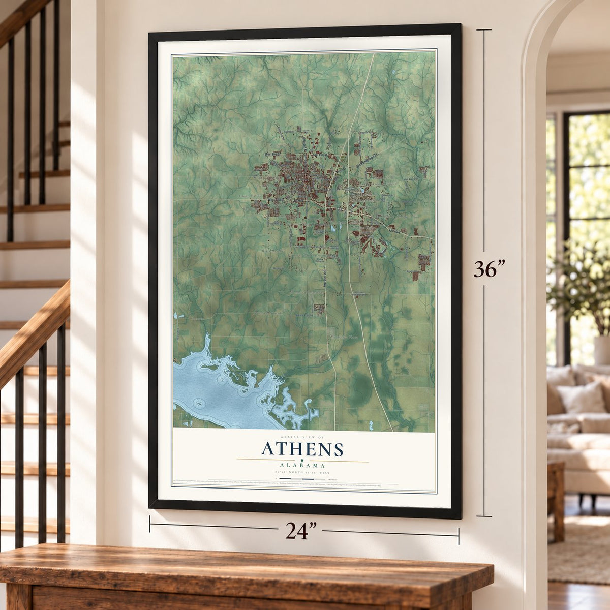 Athens, Alabama map, 24 x 36 inch print in a black frame by a staircase