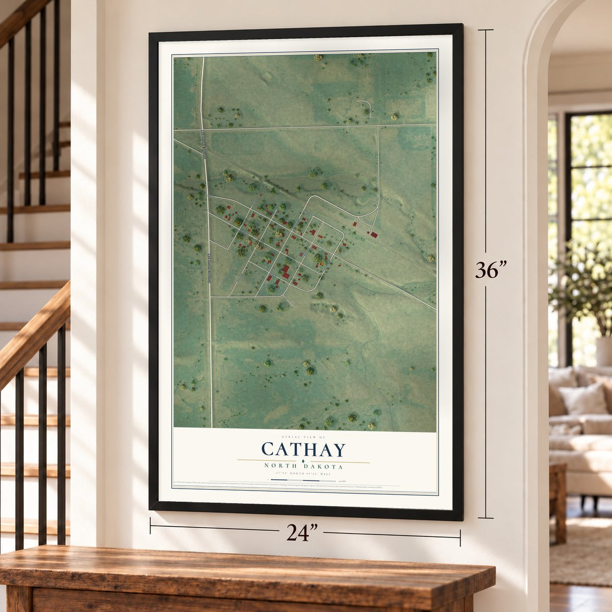Cathay, North Dakota map, 24 x 36 inch print in a black frame by a staircase