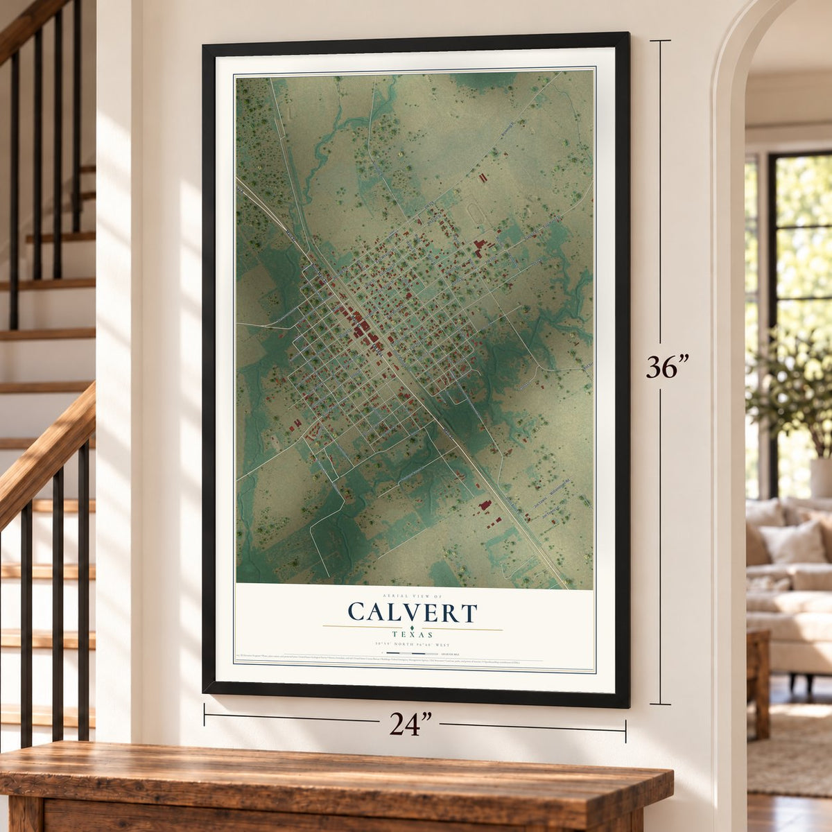 Calvert, Texas map, 24 x 36 inch print in a black frame by a staircase