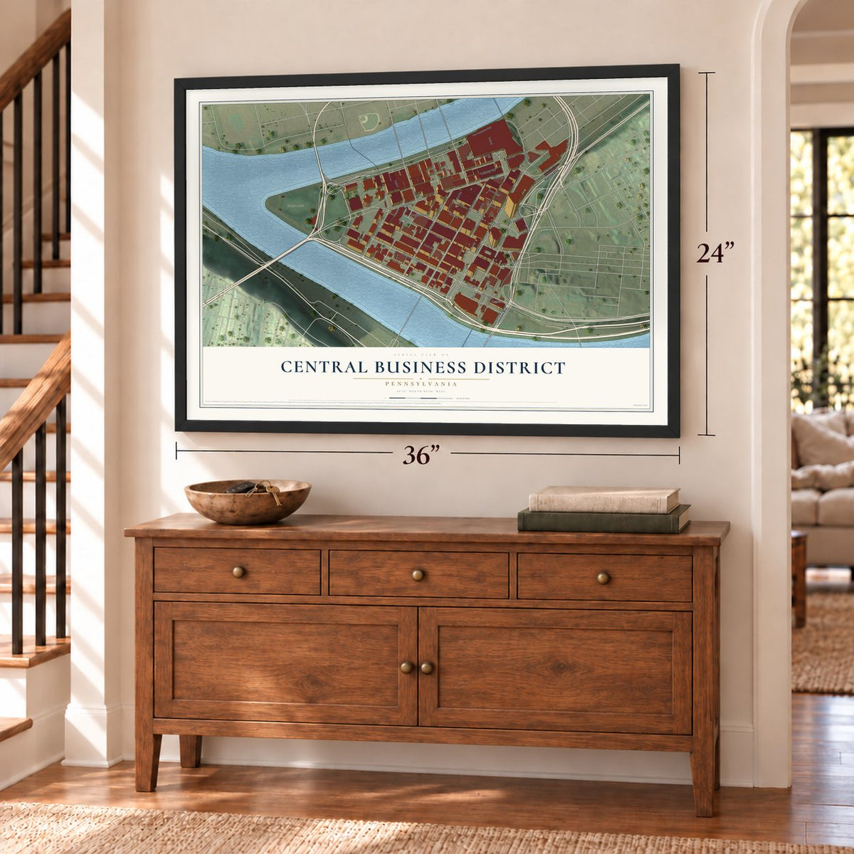 Central Business District, Pennsylvania map, 24 x 36 inch print in a black frame above a dresser by a staircase