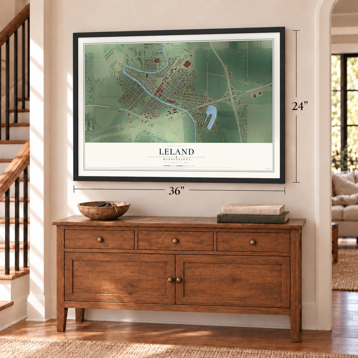 Leland, Mississippi map, 24 x 36 inch print in a black frame above a dresser by a staircase