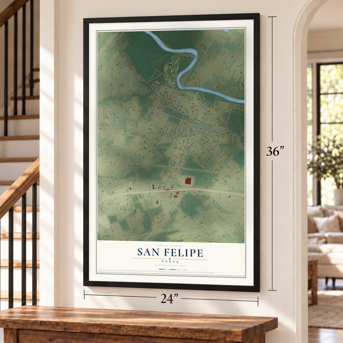 San Felipe, Texas map, 24 x 36 inch print in a black frame by a staircase
