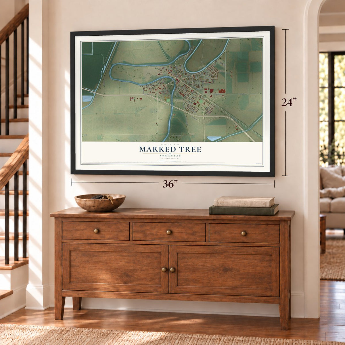 Marked Tree, Arkansas map, 24 x 36 inch print in a black frame above a dresser by a staircase