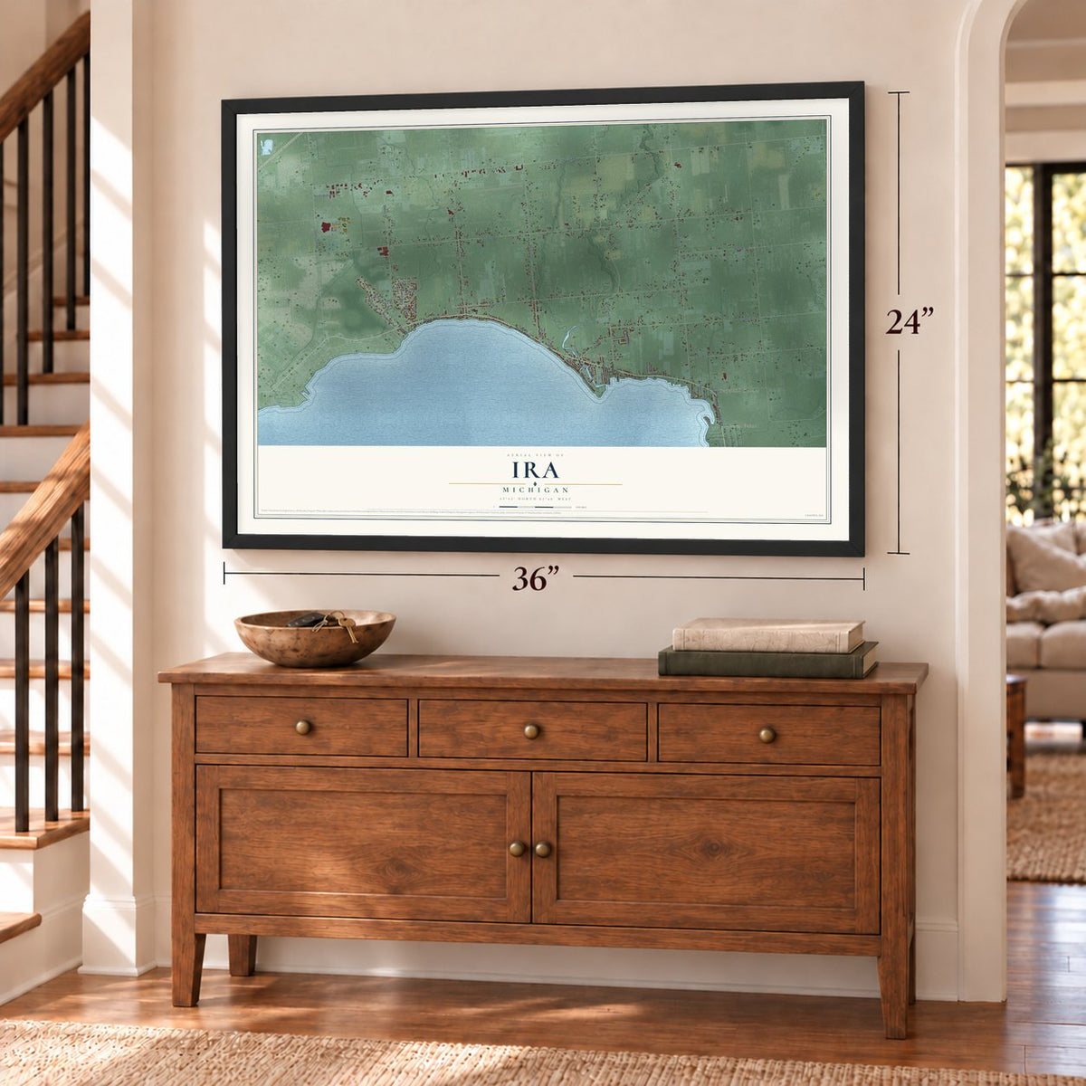 Ira, Michigan map, 24 x 36 inch print in a black frame above a dresser by a staircase
