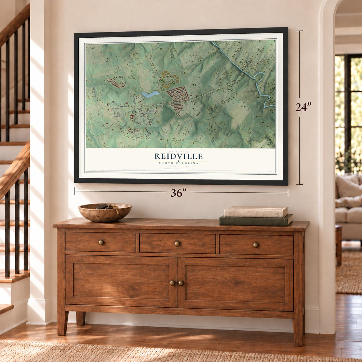 Reidville, South Carolina map, 24 x 36 inch print in a black frame above a dresser by a staircase