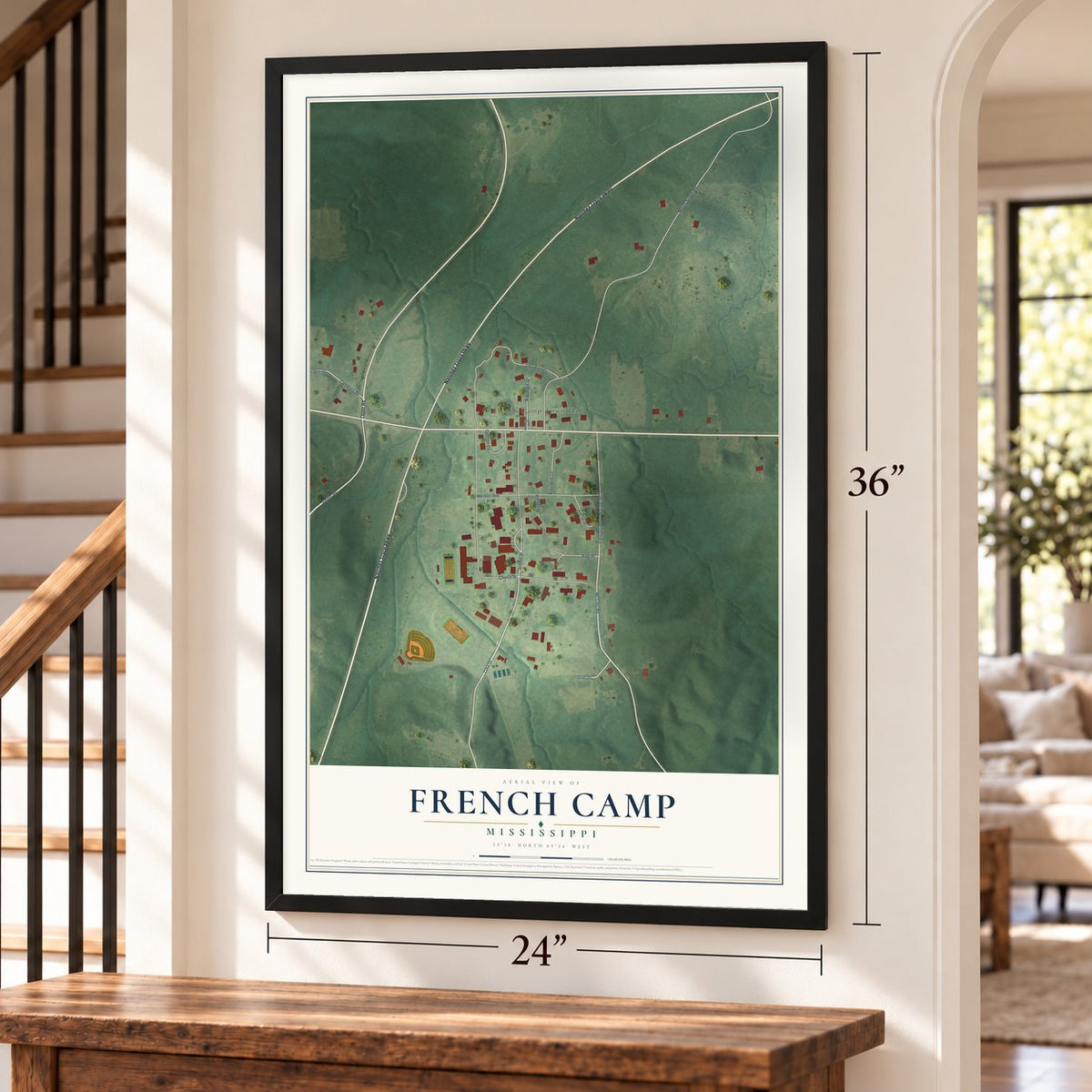 French Camp, Mississippi map, 24 x 36 inch print in a black frame by a staircase
