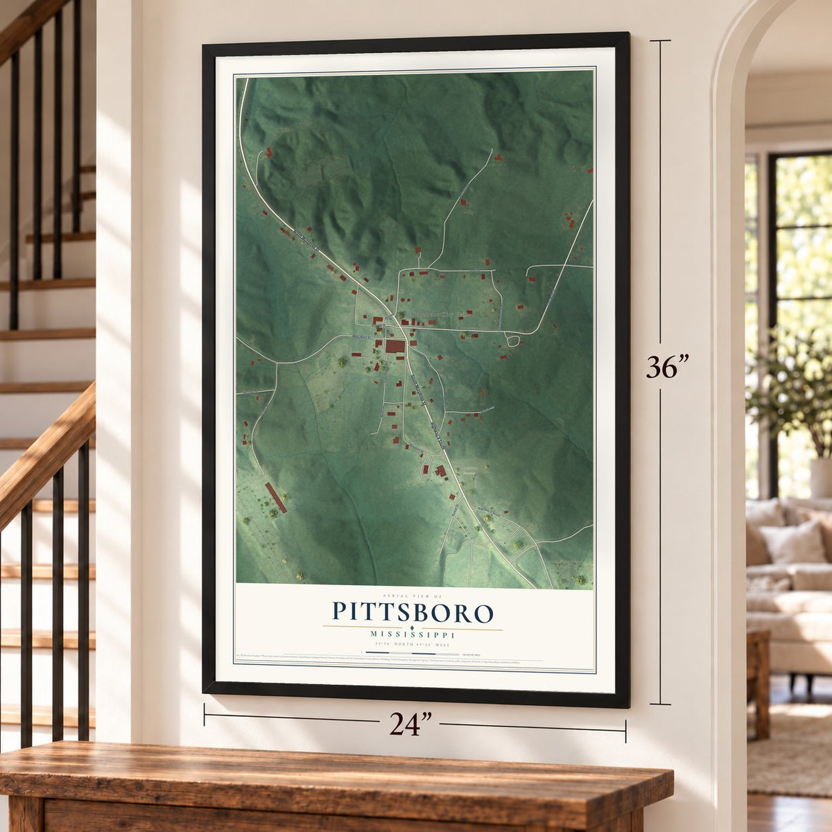 Pittsboro, Mississippi map, 24 x 36 inch print in a black frame by a staircase