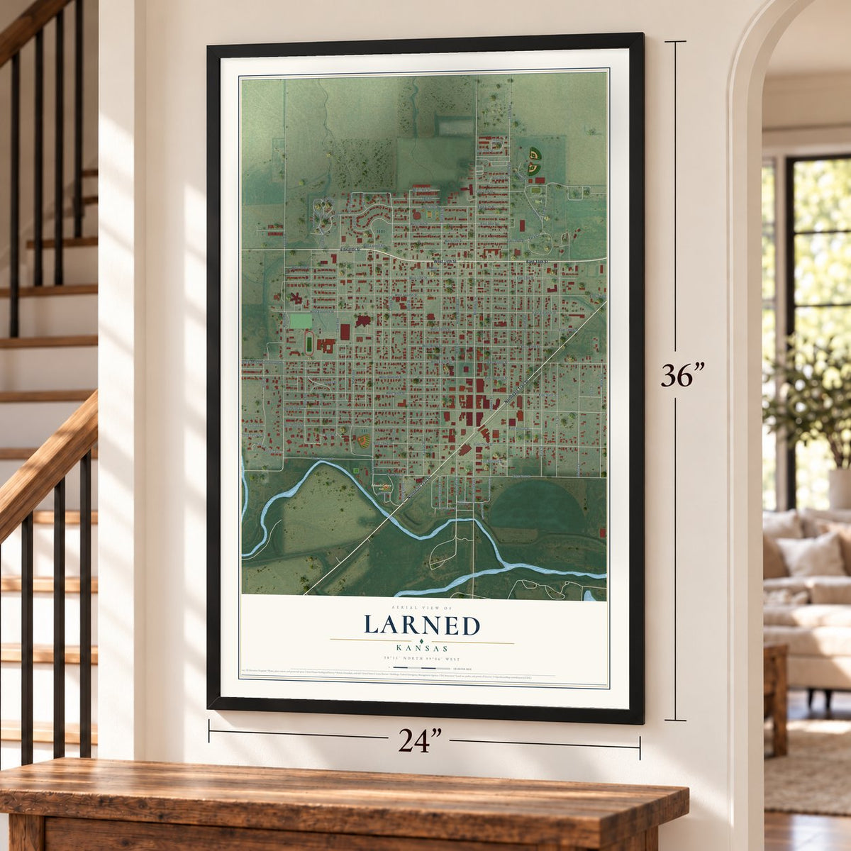 Larned, Kansas map, 24 x 36 inch print in a black frame by a staircase