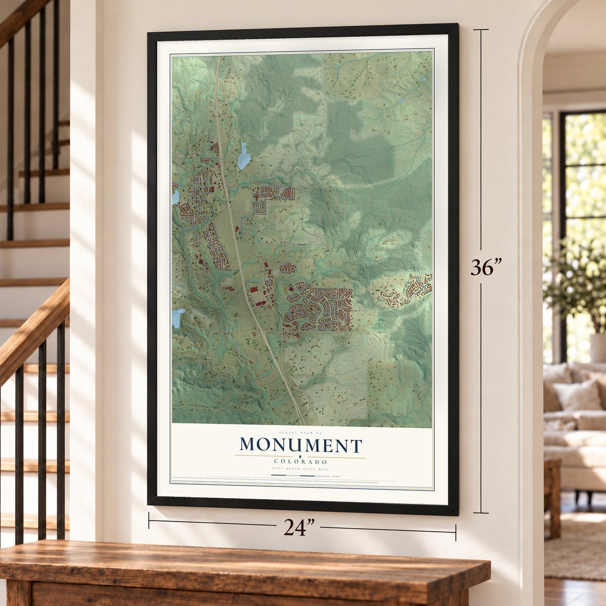 Monument, Colorado map, 24 x 36 inch print in a black frame by a staircase