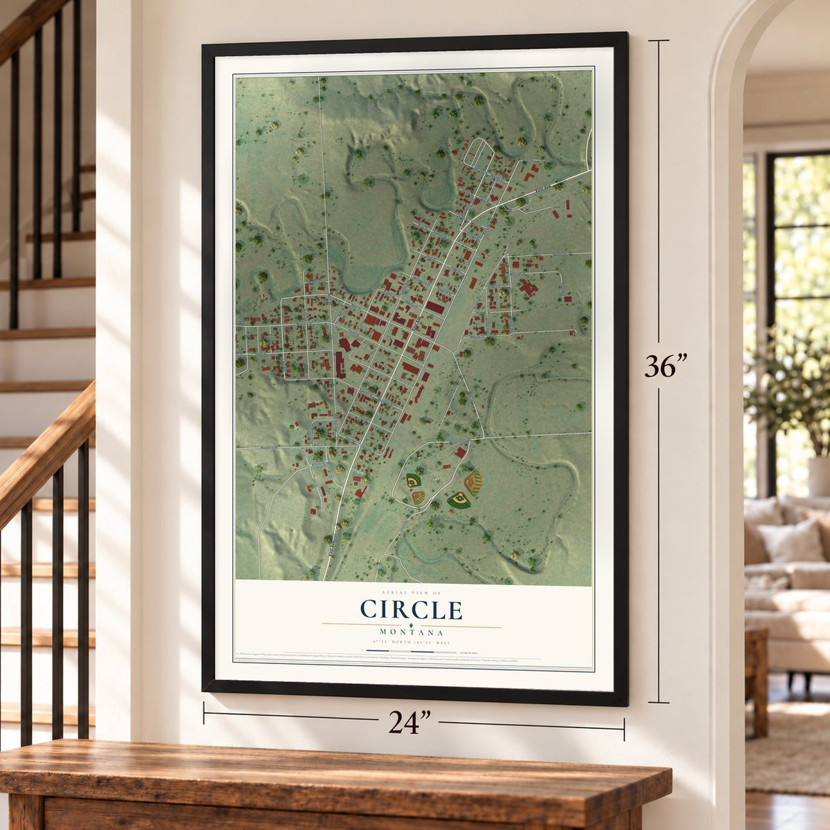 Circle, Montana map, 24 x 36 inch print in a black frame by a staircase