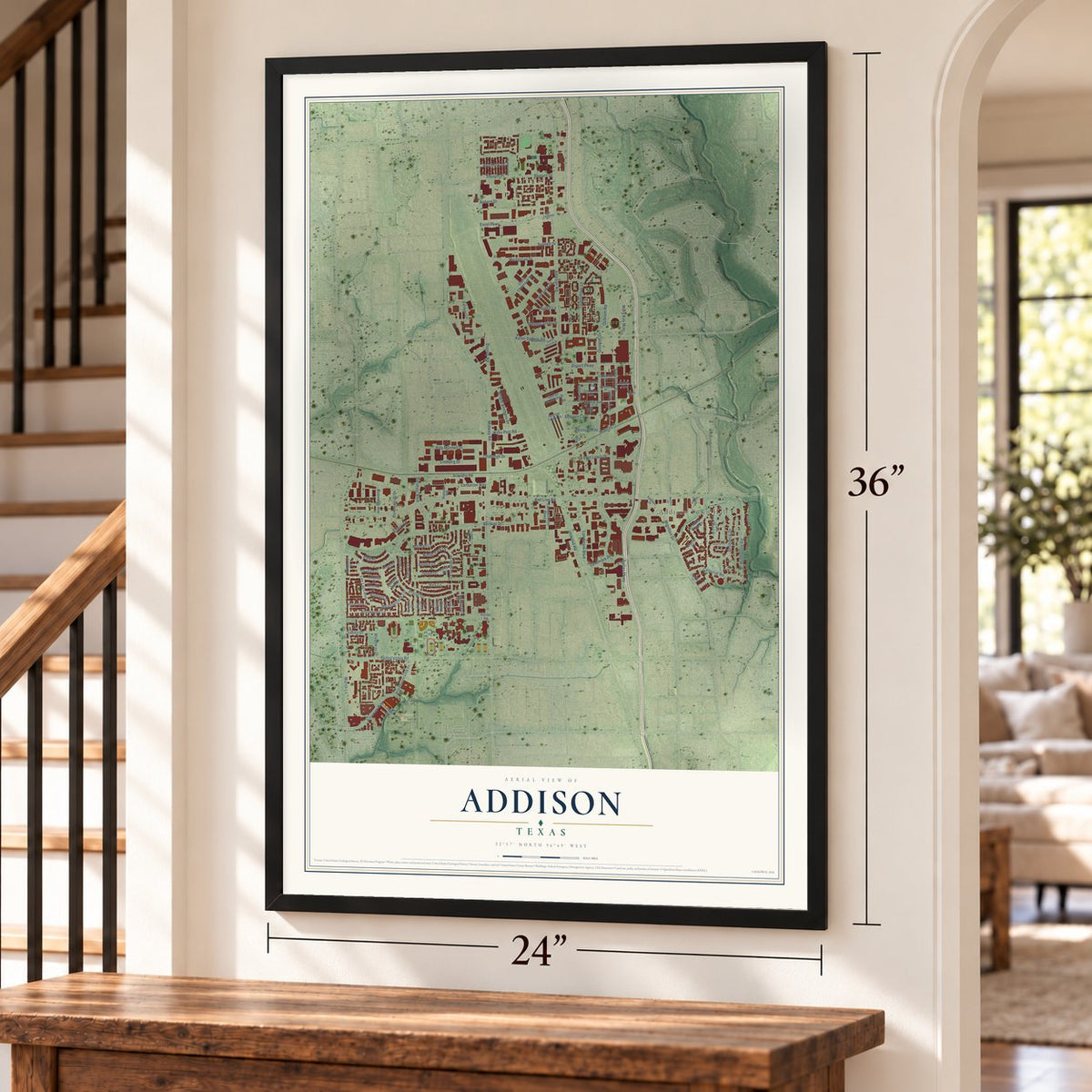 Addison, Texas map, 24 x 36 inch print in a black frame by a staircase
