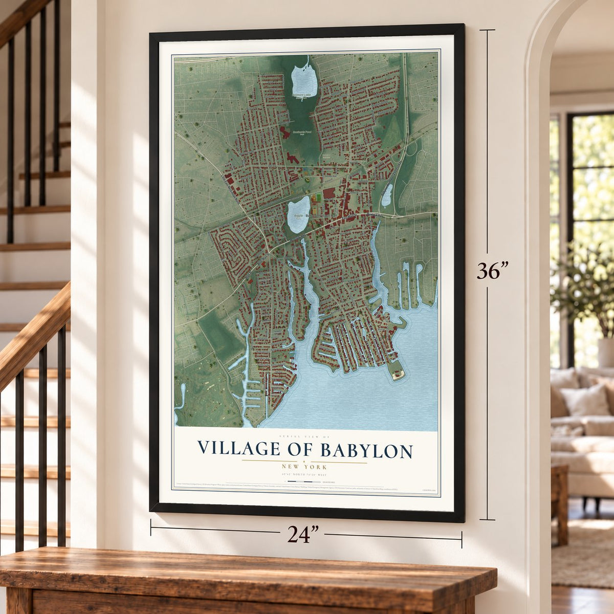 Village of Babylon, New York map, 24 x 36 inch print in a black frame by a staircase