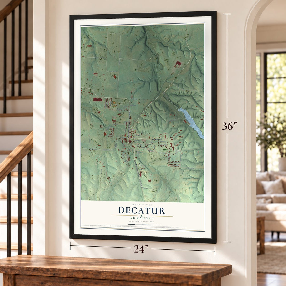 Decatur, Arkansas map, 24 x 36 inch print in a black frame by a staircase