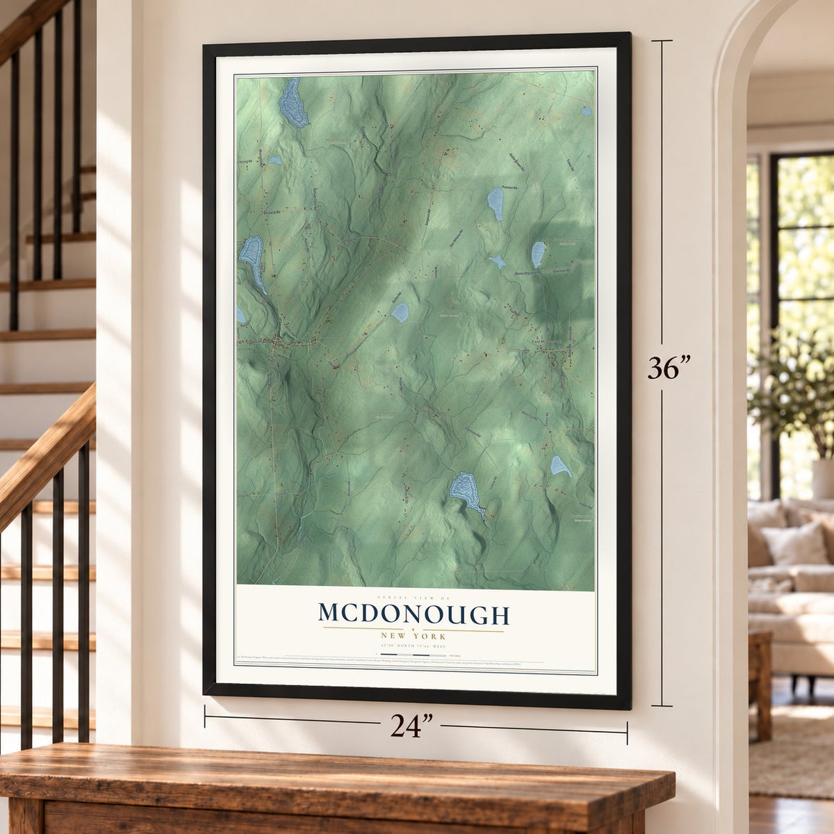 McDonough, New York map, 24 x 36 inch print in a black frame by a staircase