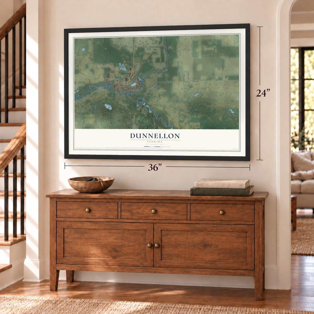 Dunnellon, Florida map, 24 x 36 inch print in a black frame above a dresser by a staircase