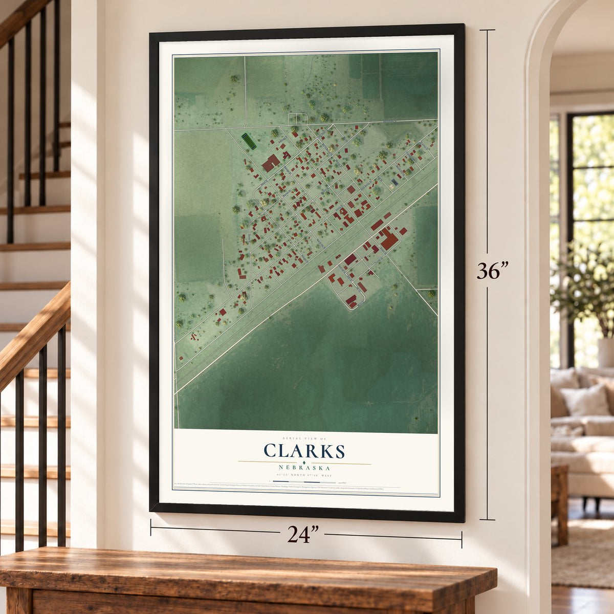 Clarks, Nebraska map, 24 x 36 inch print in a black frame by a staircase