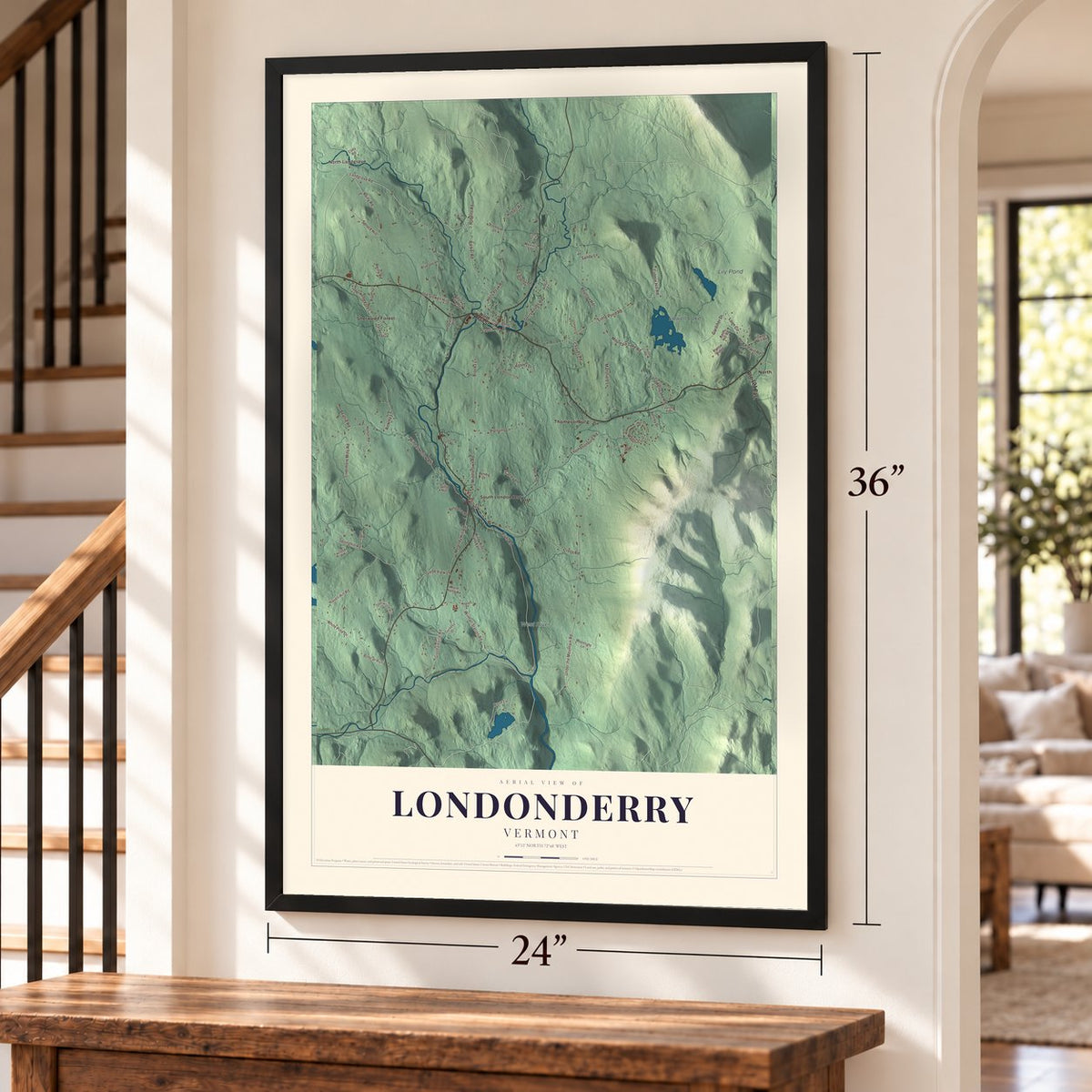 Londonderry, Vermont map, 24 x 36 inch print in a black frame by a staircase
