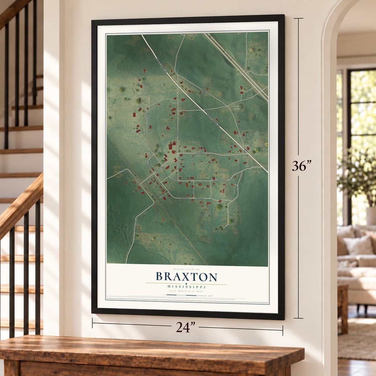 Braxton, Mississippi map, 24 x 36 inch print in a black frame by a staircase
