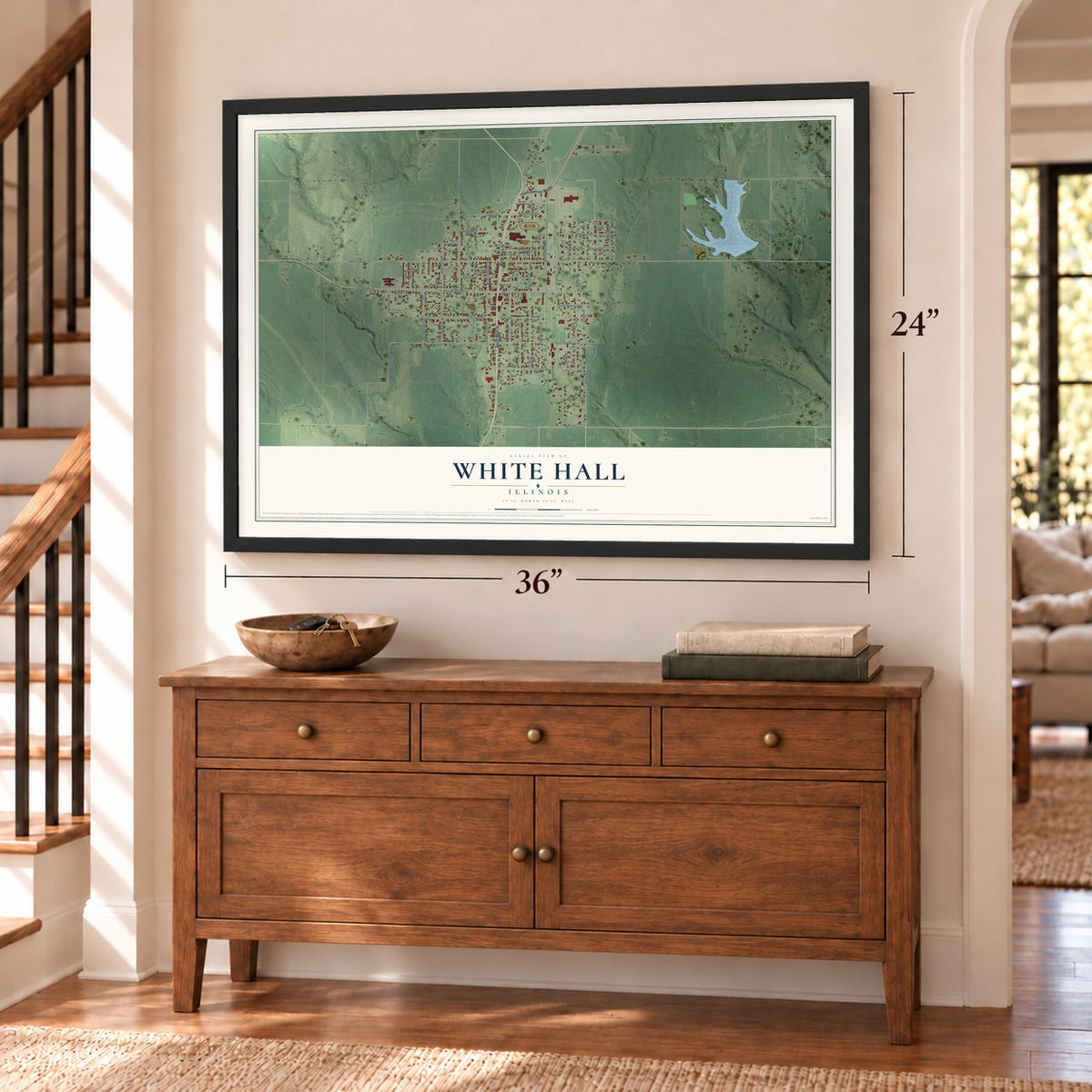 White Hall, Illinois map, 24 x 36 inch print in a black frame above a dresser by a staircase