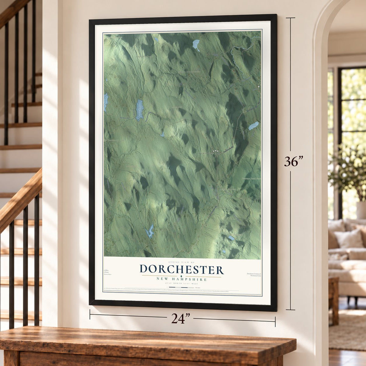 Dorchester, New Hampshire map, 24 x 36 inch print in a black frame by a staircase